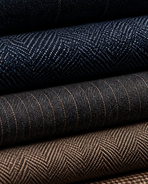 Détail de matières et de finitions d’un costume sur mesure Formens